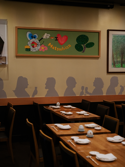 Classic wooden dining tables inside Matsuhisa