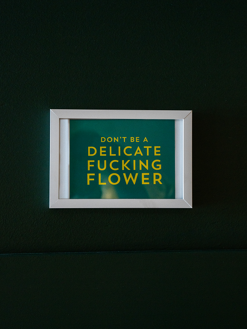 Framed delicate flower sign